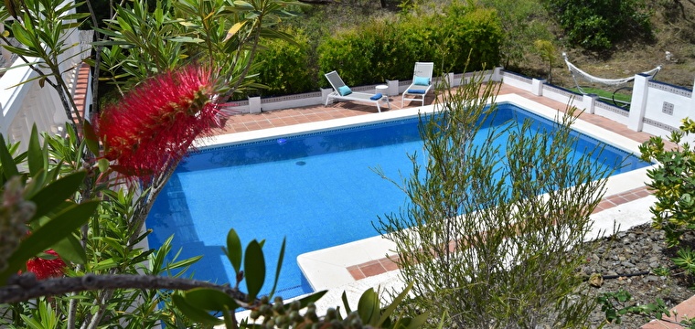 Pool, lounge area and sun terrace