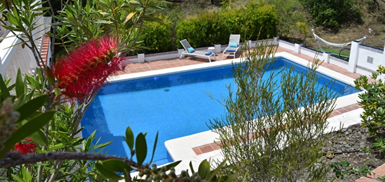 Pool, lounge area and sun terrace